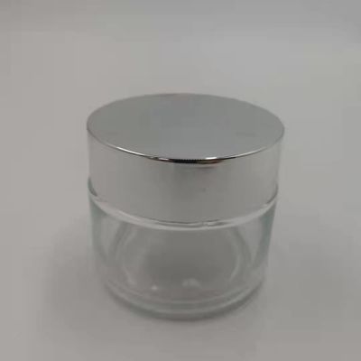 MSDS Clear 100g Glass Cream Jar Dengan Shiny Silver Cap White Lid Mask Mud