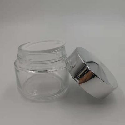 MSDS Clear 100g Glass Cream Jar Dengan Shiny Silver Cap White Lid Mask Mud